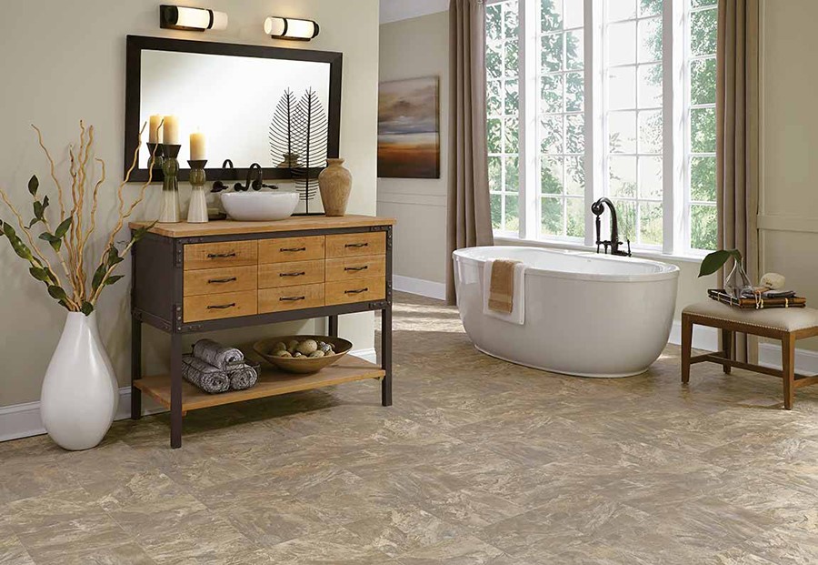 Bathroom with dark tiled floors